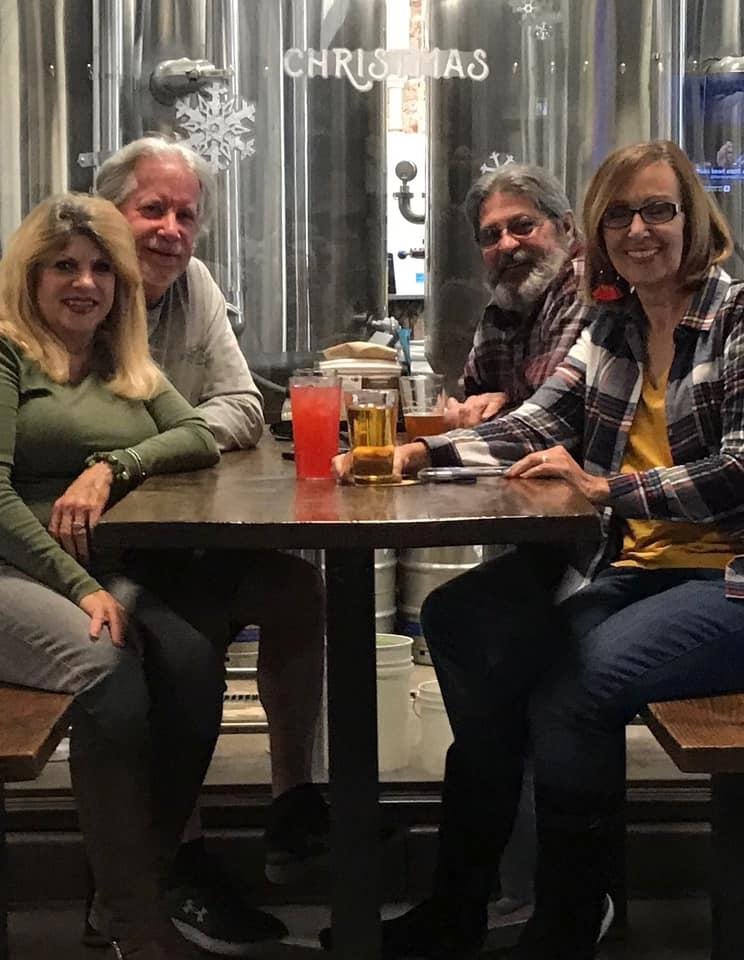 Having fun with friends at stadium pizza