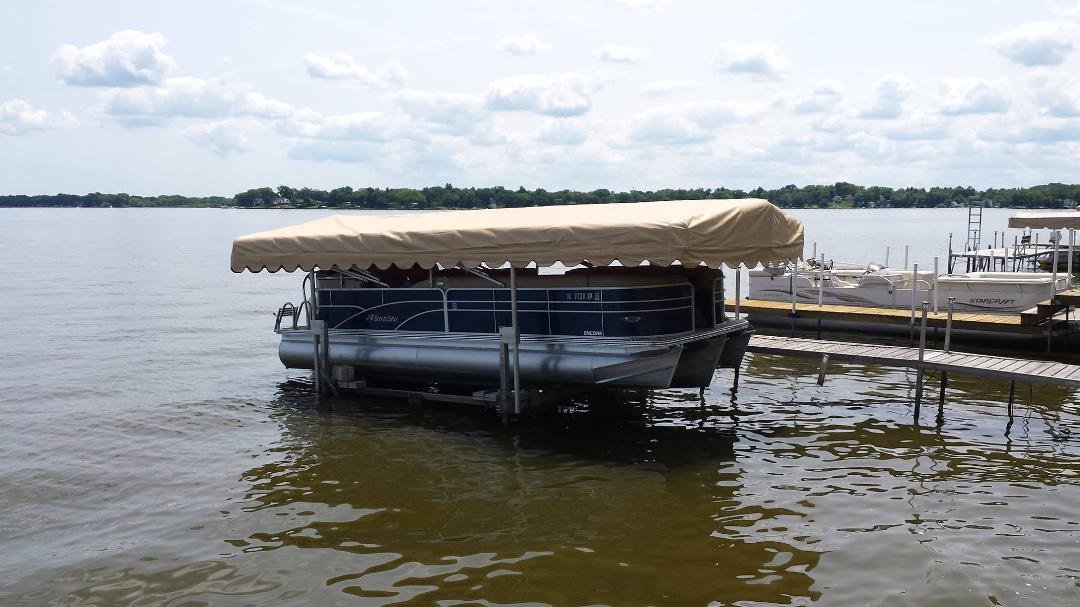 At last, got the boat lift working. This is perfect. The boat is out of the water and covered by a canopy 10 feet wide and 30 feet long. Very happy.