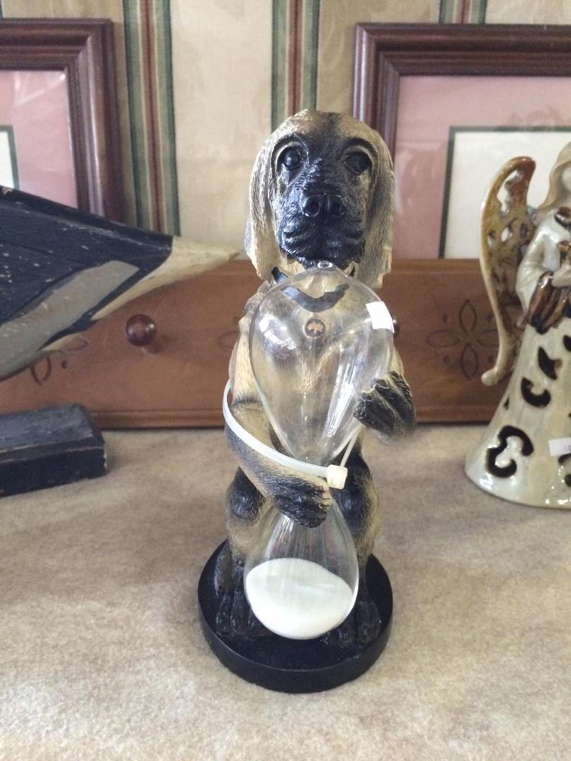 Part of the fun rummaging is finding really kitschy stuff. If this sad dawg holding onto an hourglass wasn't priced at $39.99 at the Brighton Salvation Army, my son Geoff would now be its proud owner. Seriously though, $39.