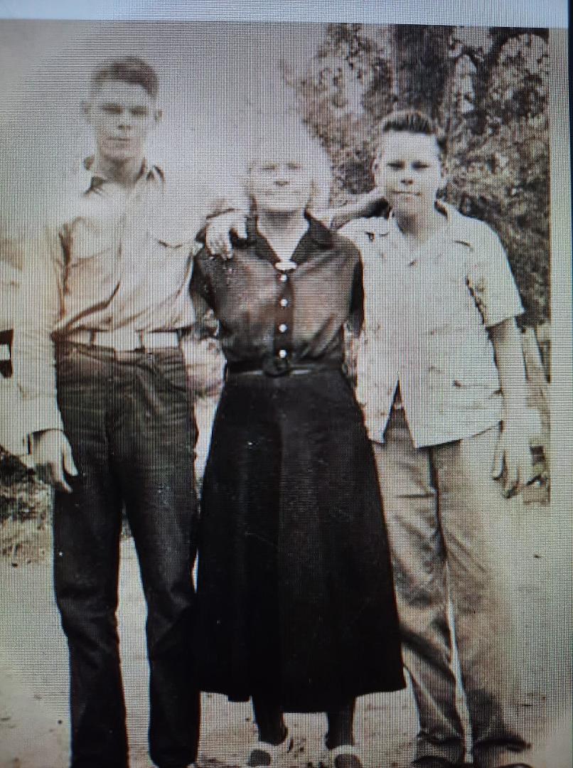 I just found a photo of my grandpa and his mother. Talmage Baggett