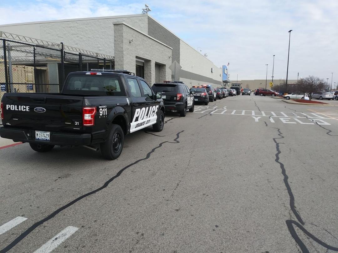 Looks like the entire Granite city police with swat team is at walmart.