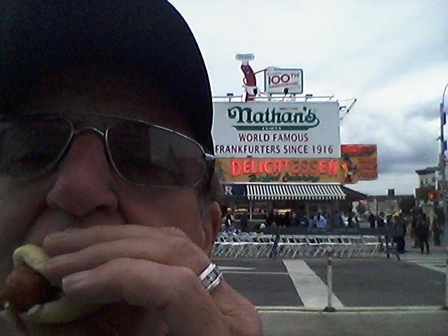 I'm here at Nathan's Coney Island for the 100th anniversary just happen to be here for the car show I waited a hundred years for this hot dog