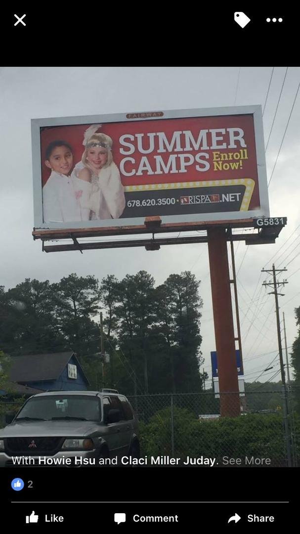 My grandson the actor sharing his personage on a billboard.