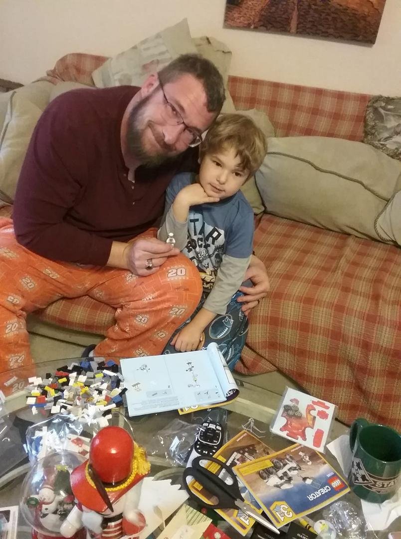 My 2 favorite engineers building Lego Creator space ship.