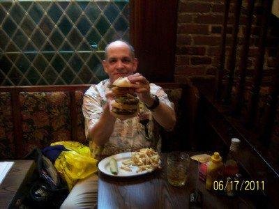 Holding the Normburger. A foot tall. Had to dissect that before I could bite into it.