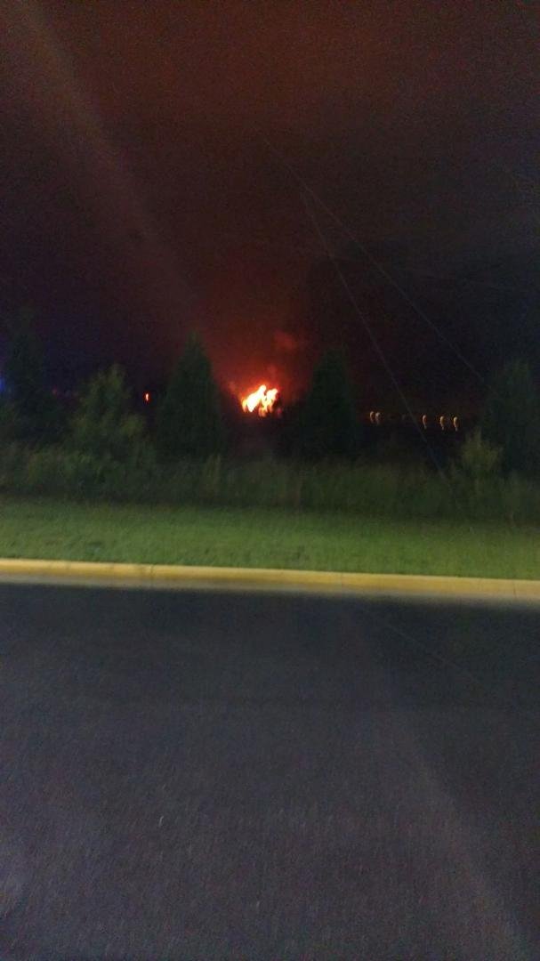 Came out to get in my truck after finishing up my last delivery at store 419 Virginia Beach and this house behind the store was up in flames.