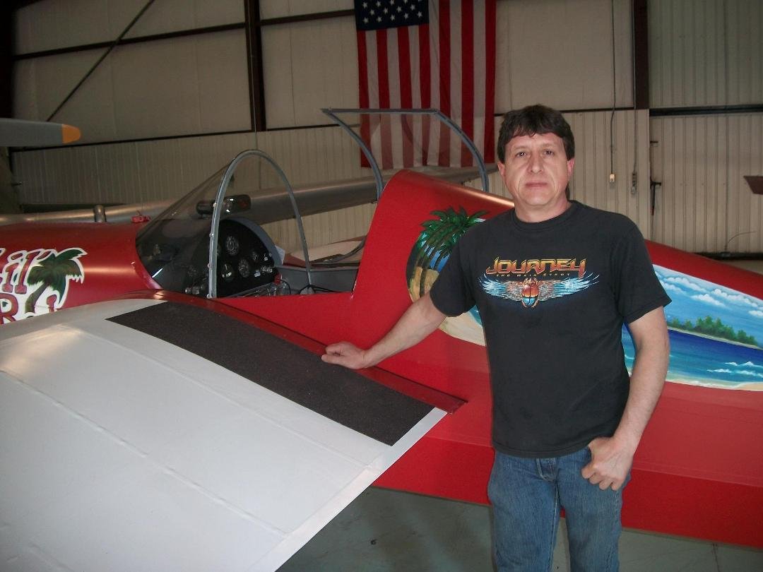 Todd Rumsey with the Lark; he started with a pile of pieces and put it together into a flying airplane!