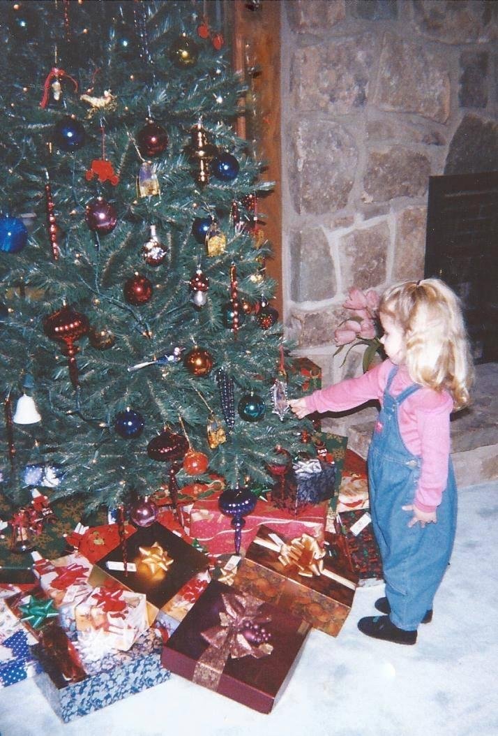 Jessica Greene helping Dr. Wudy decorate the Christmas tree in Gatlinburg.