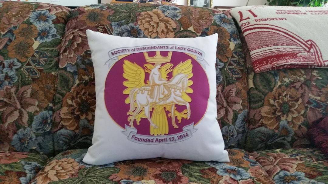 I love the pillow that Madeline Alworth, Society of Descendants of Lady Godiva Adornment Chairman gave me!