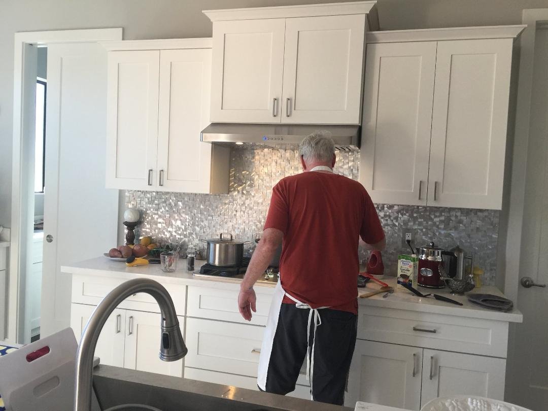 Mike Cooking Dinner.