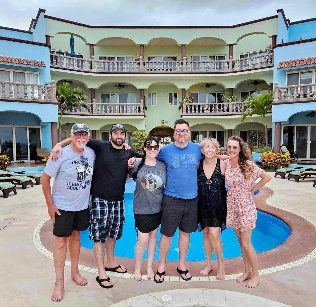 TacoCats (me, Simon, Leah, Aaron, Sheila & Kezia) with Las Casitas condos in background