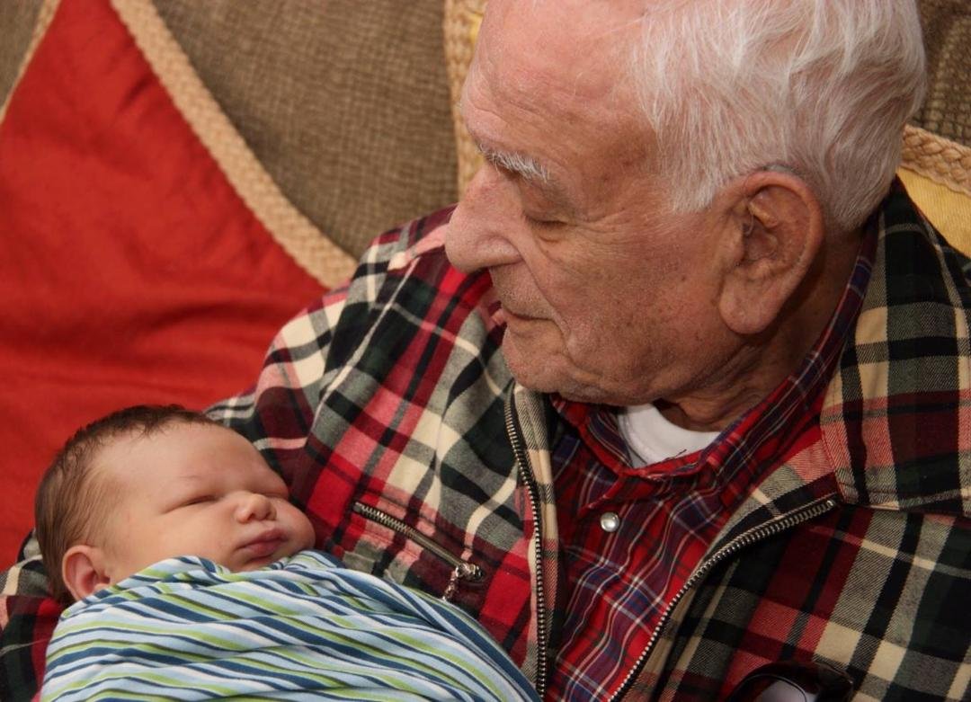 And then there's this - my 92 year old dad holding our first grandson (Isaiah).