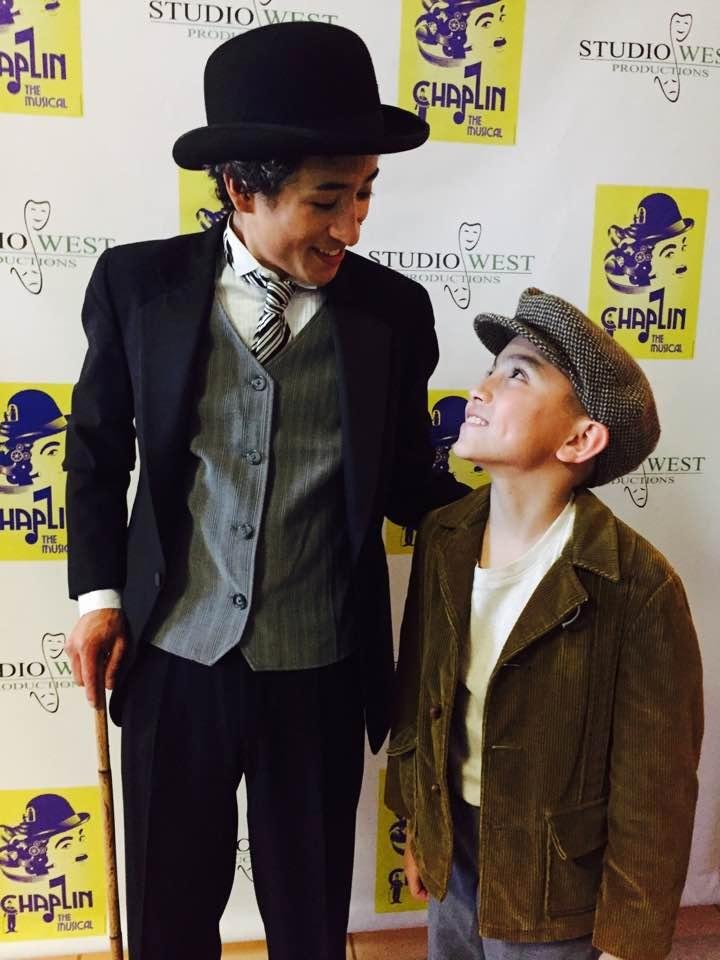Young Charlie and his grown up self gaze through time at themselves.
