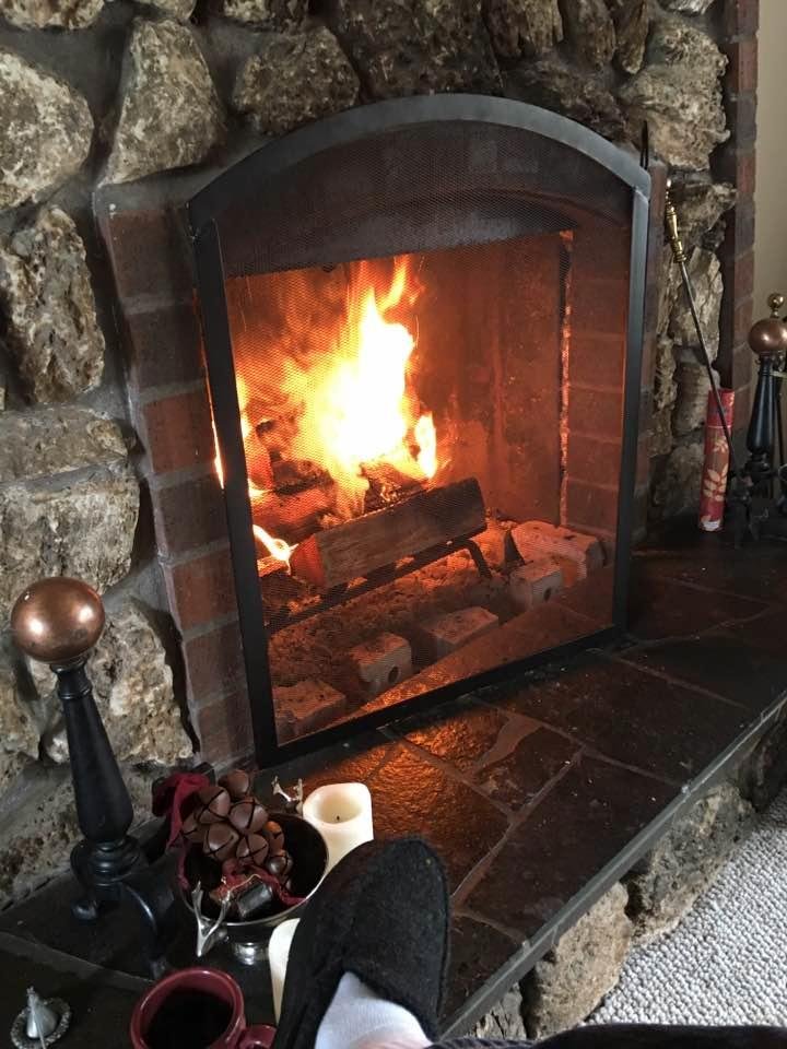 Rainy windy day, fire in fireplace, supposed to go to Rainers game, not looking good!