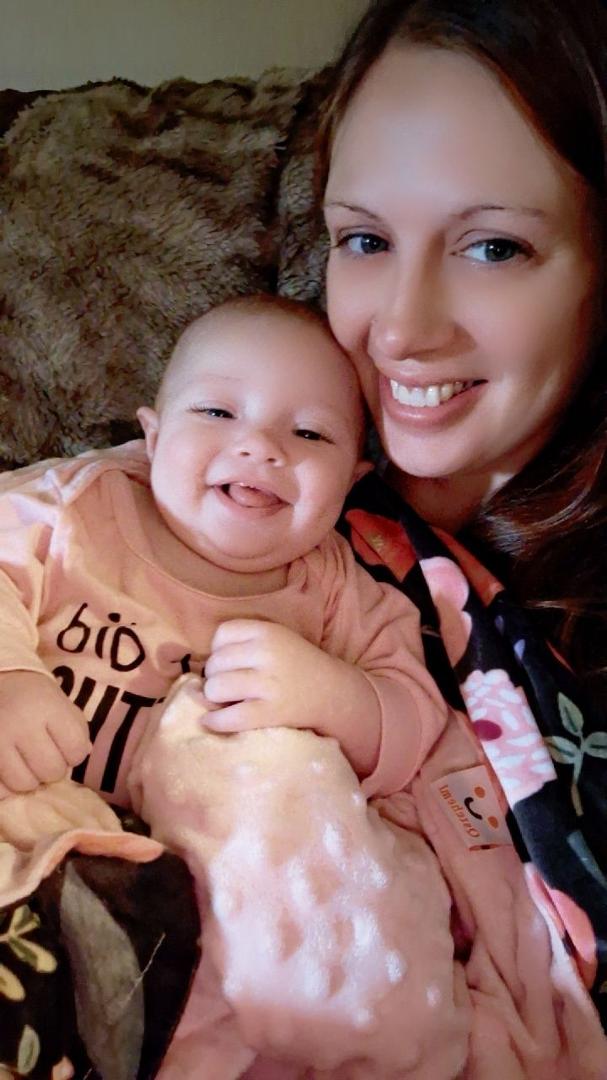 Granddaughter Heather with my newest great grandchild Zoey