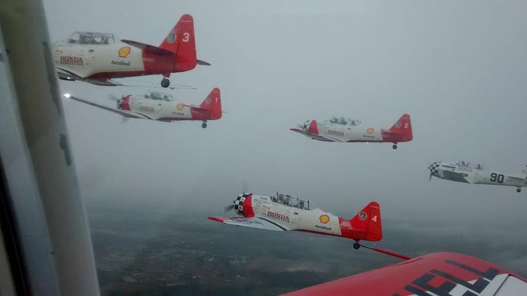Flying with the Aeroshell Aerobatic team.