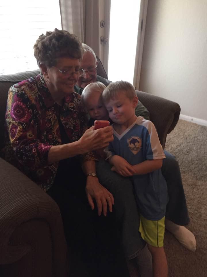 A lap full of great grandchildren.