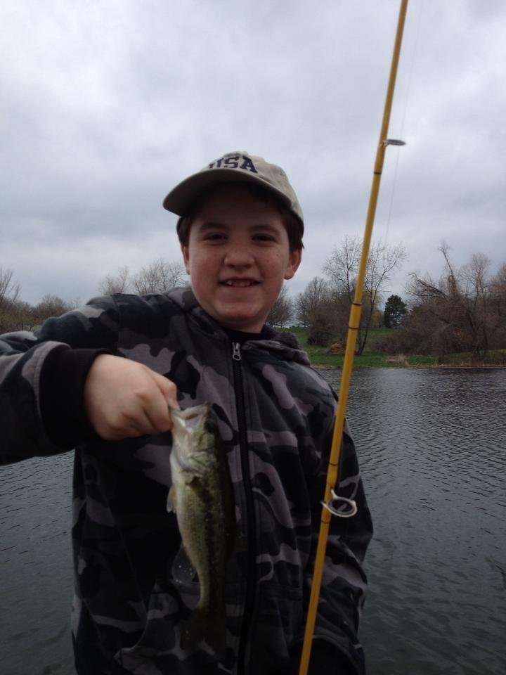 Happiness is what happens when fishing with my grandchildren