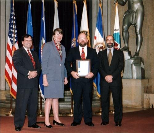 Old selfie with Attorney General Janet Reno getting a big one!