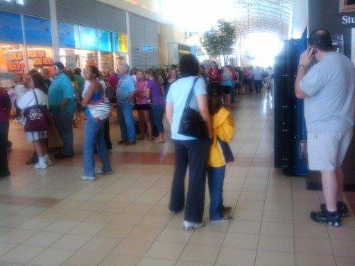 This is the line at the Old Navy $1.00 flip flop sale at 9:15 this morning.