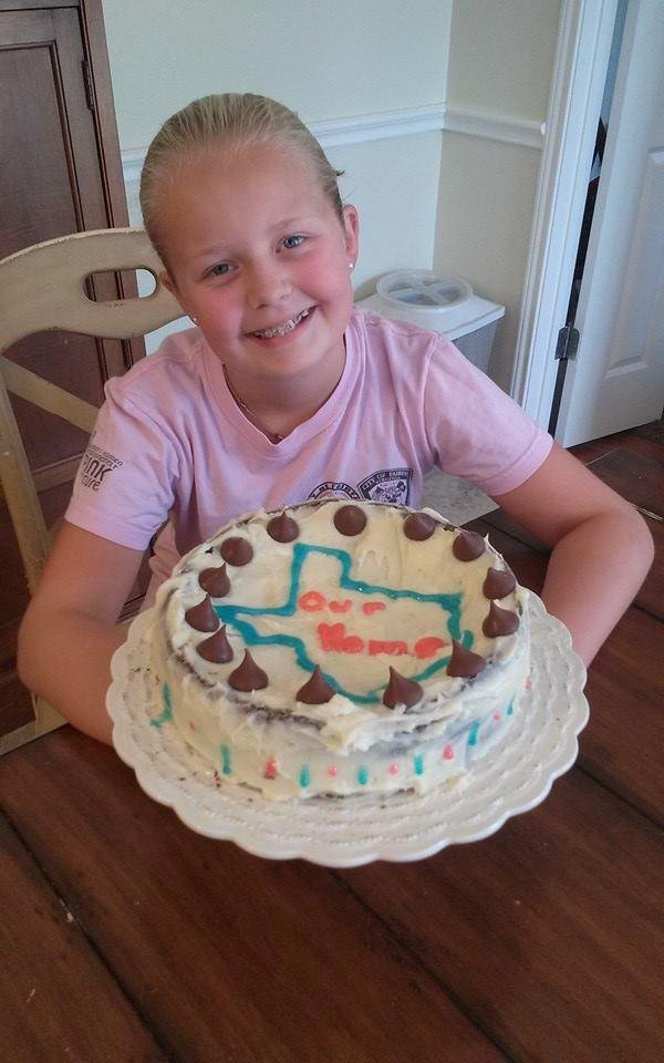 My darling granddaughter... the next cake boss! 1 year in Texas anniversary cake, made from scratch! YUMMY, YUMMY!