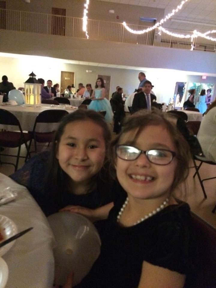 Savannah hanging out with friends at the Father Daughter dance.