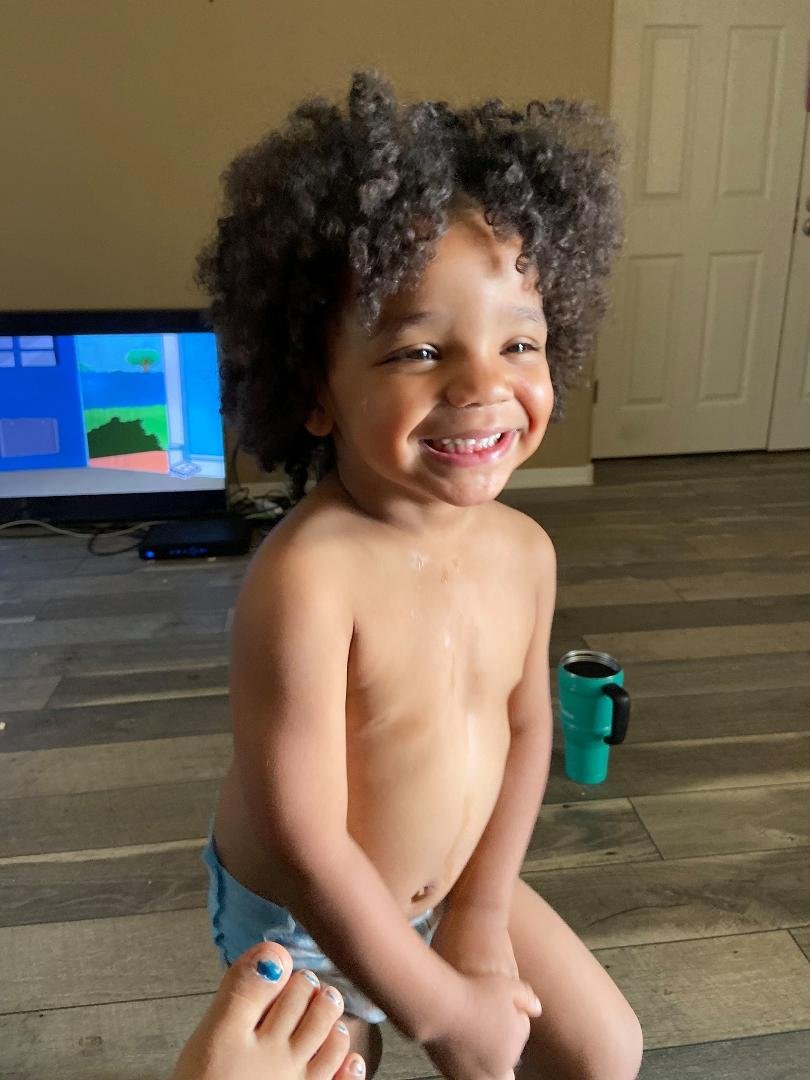 MESSY HAIR AND HE DONT CARE..I SAID PENUT WHATS UP WITH UR HAIR SON,,HE SAID I WOKE UP LIKE THIS..LOL THIS KID..