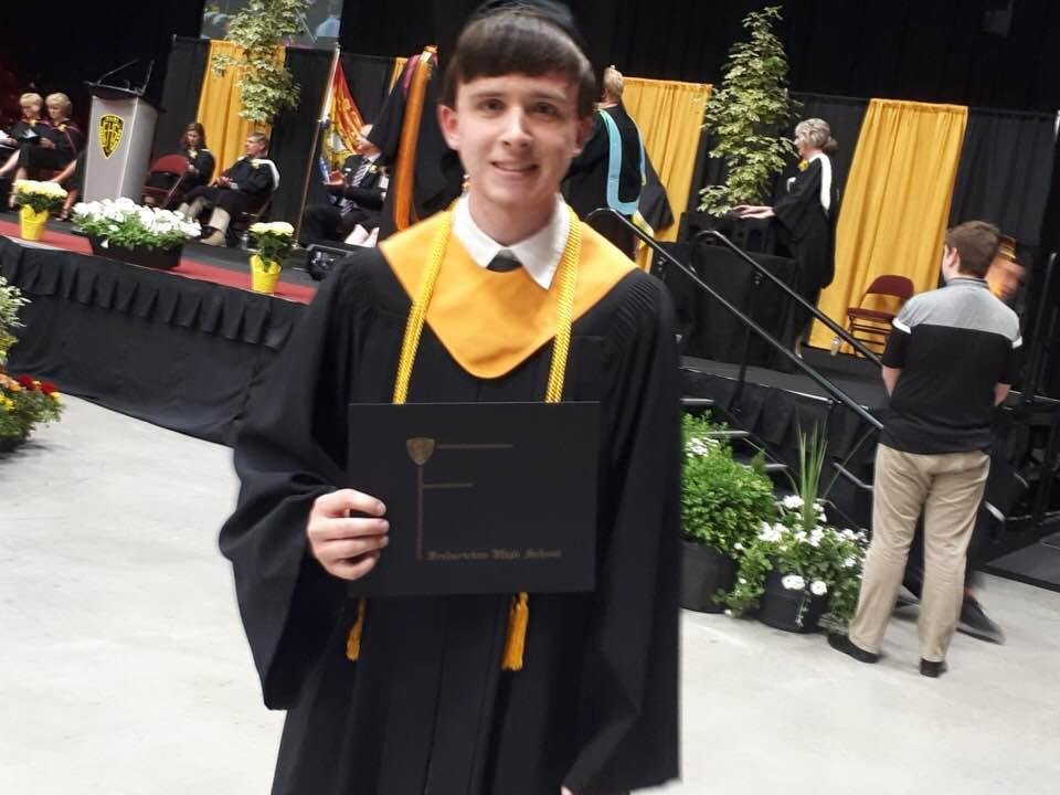 My special Grandson Nathan following the presentation of his High School Diploma at Fredericton High School.  You make us proud  wearing the “GOLD CORD”   Representing  “THE BLACK F”  and Graduating with Honours.  Keep up t