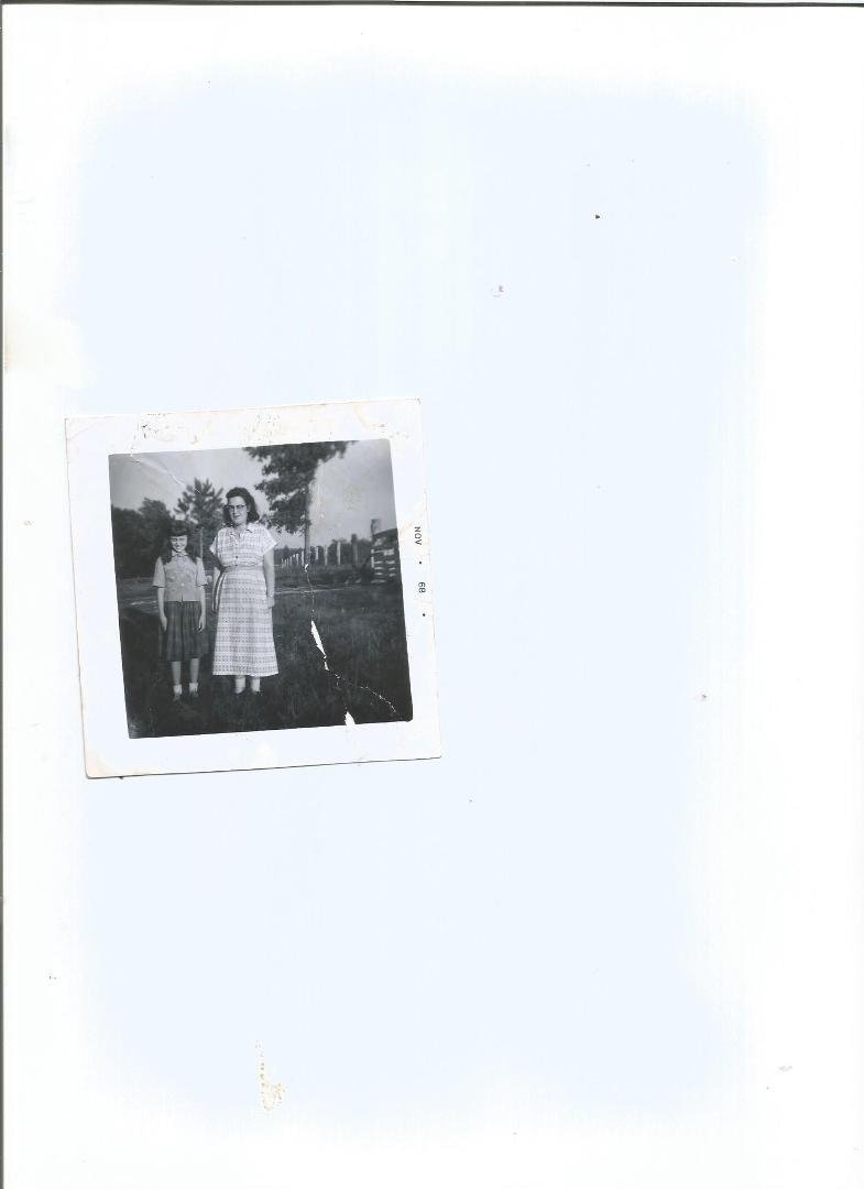Picture of my Mom and me wearing a shirt and skirt my grandma Cramer made me when i was about 10 maybe 11 years old
