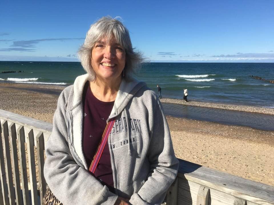 My lovely wife shivering in the cold at Lake Superior.