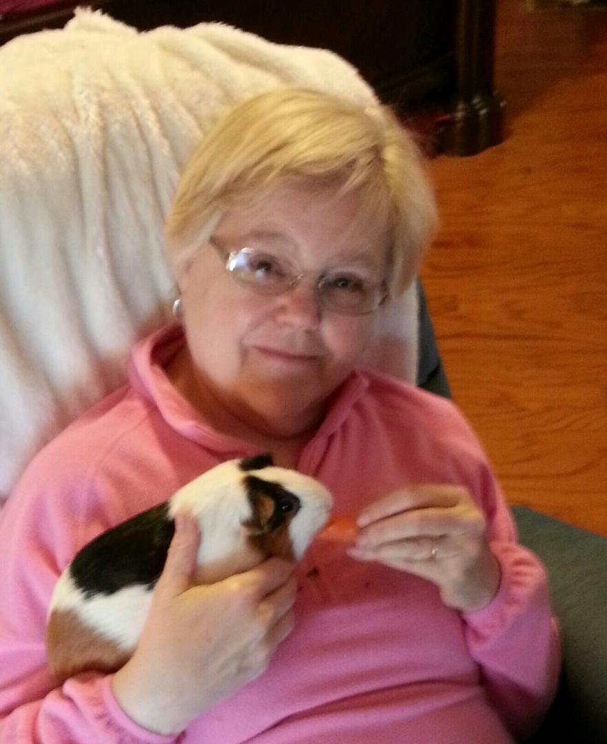Another important part of teen-sitting your grand kids is to learn to love & feed their pets. This is Button.