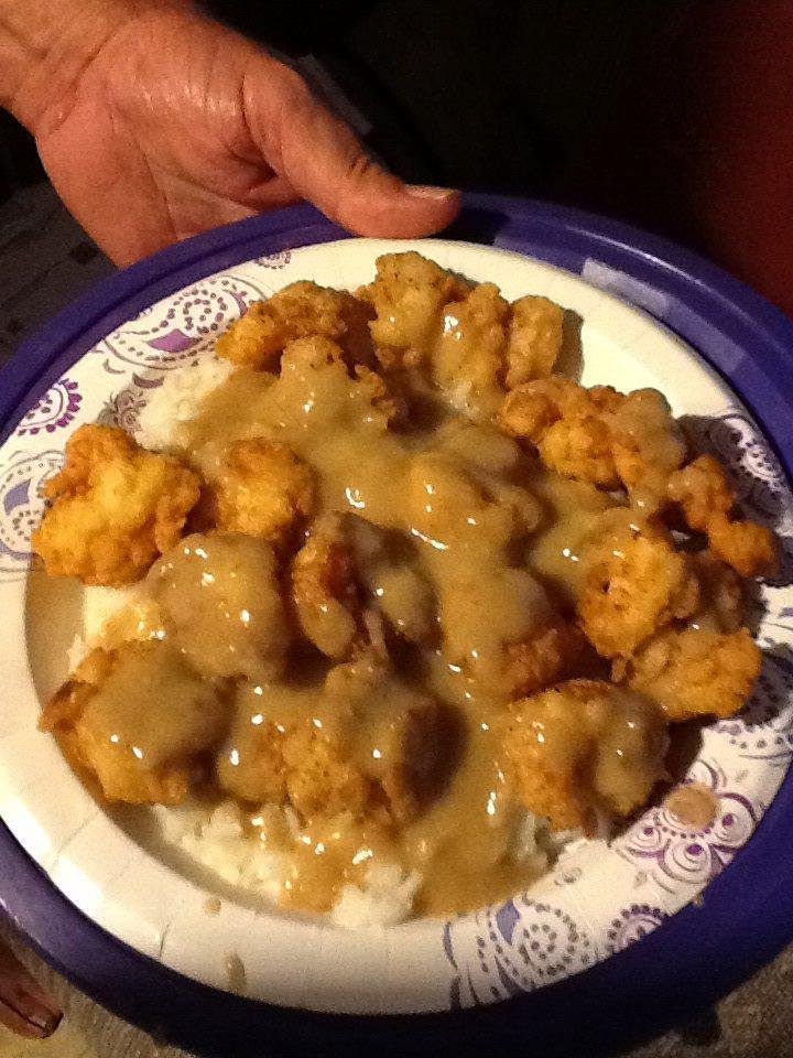Shrimp and brown gravy and rice