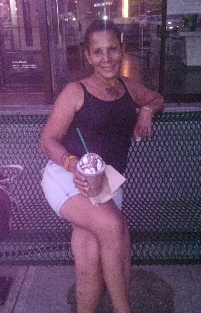 Sitting at Ridgeway, drinking a Frappe and enjoying convo on phone wit friend