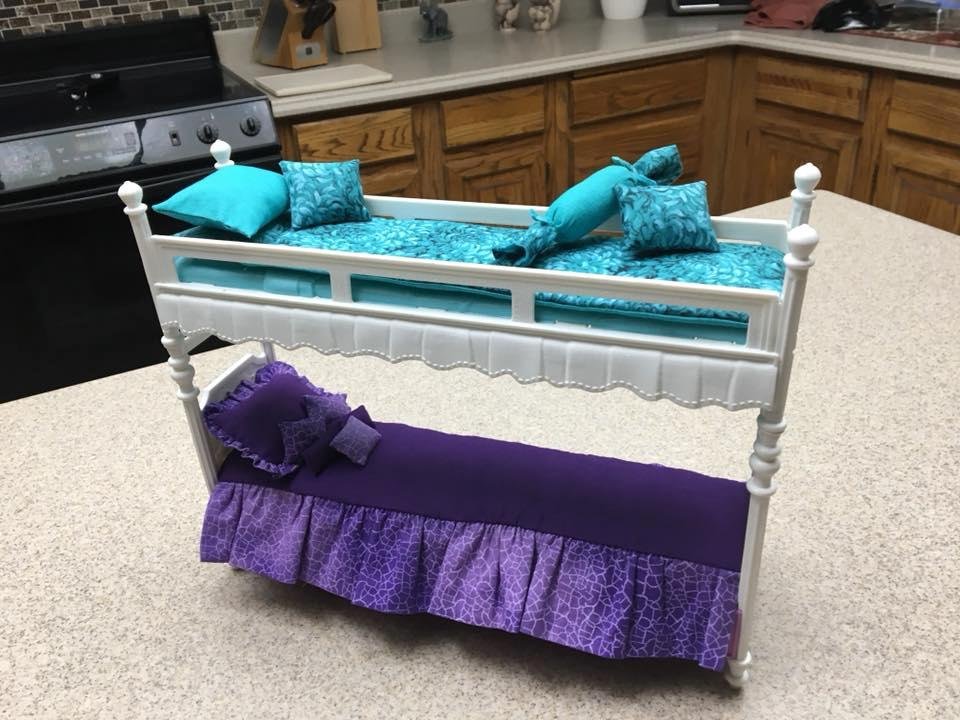 My niece asked me to make bedding for her Barbies! Not too bad!