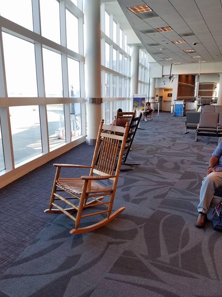 Only in the south...rocking chairs in the airport waiting area! 😊
