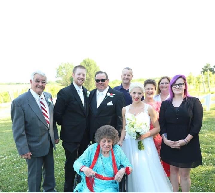 I have this 1 pic of part of our clan at Allyssa's wedding that I wanted to post,(I  guess there are more coming that will have our whole clan in them) but I couldn't wait to post this one. 
Kathy's in front, from left me, 