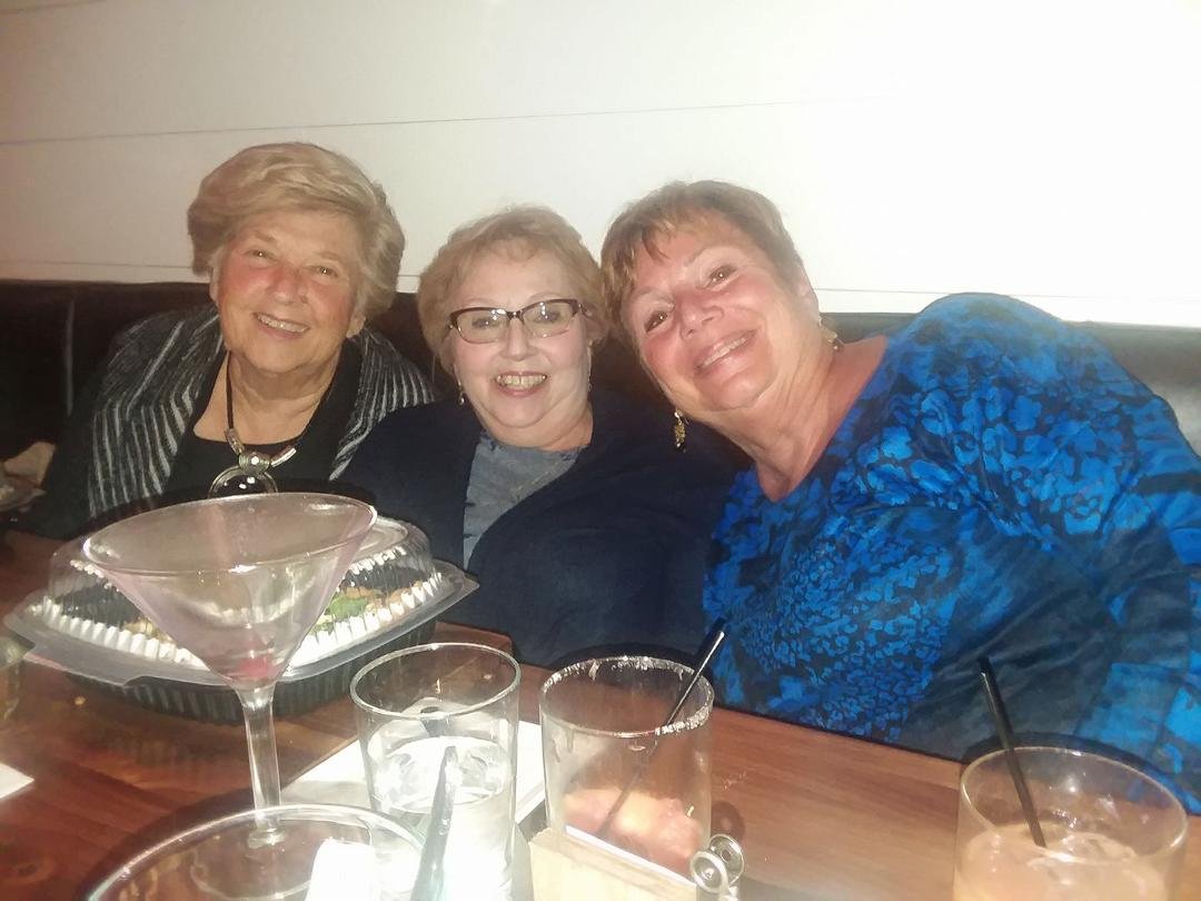 Happy cousins at dinner together.