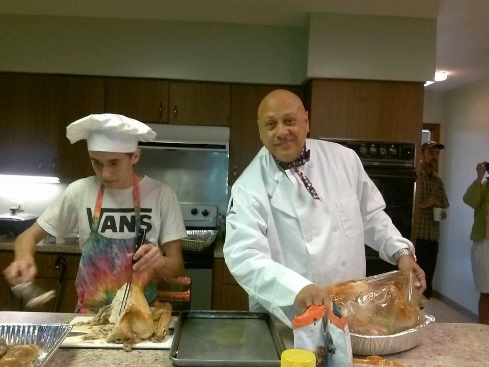 Thanksgiving Turkey carving going on at Sheriffs Youth Ranch Nov 27