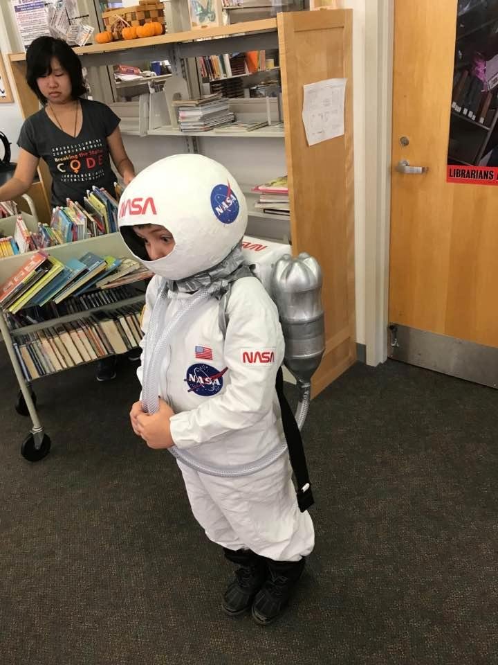 Matty is rocking the homemade astronaut costume!