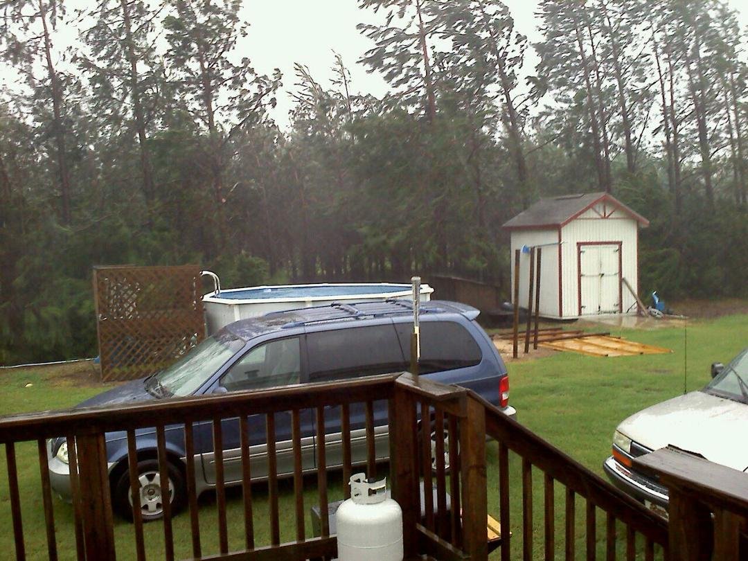 Backyard fence around pool gone..front yard has a new lake!