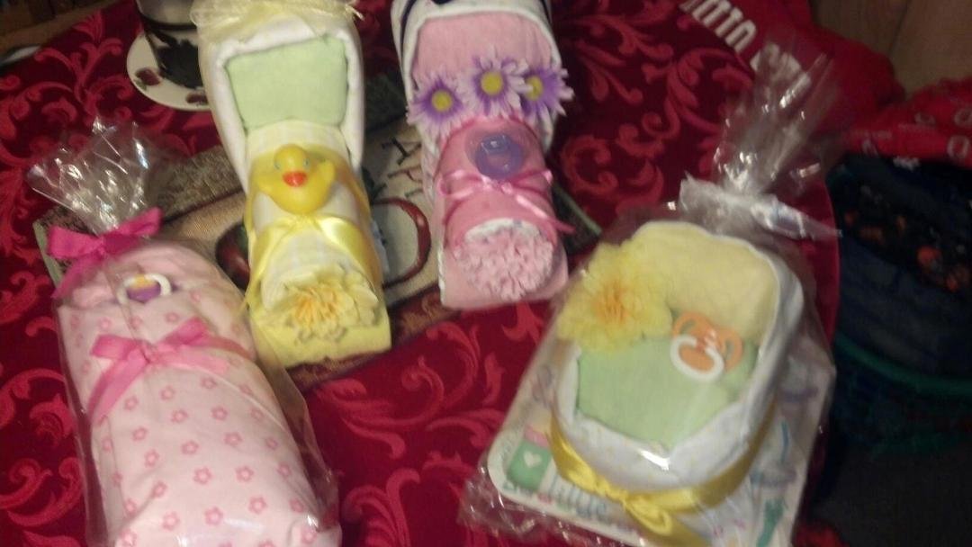 Here r some diaper cake creations i still have.
Diaper trains 25.00 each
Diaper baby 25.00
Diaper bassinet 15.00