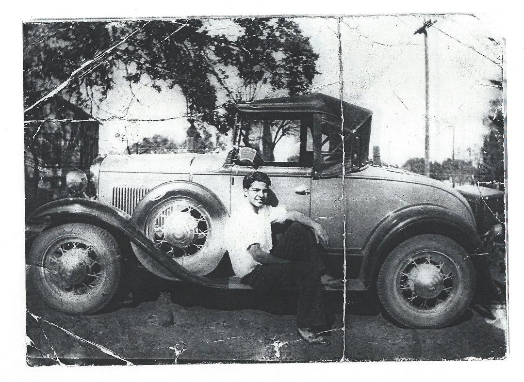 Just thinking about my dad and cars This is a pic when he was 18 yo and moving off the reservation to LA. notice Model A Ford. He passed in 1966 Loved the guy''