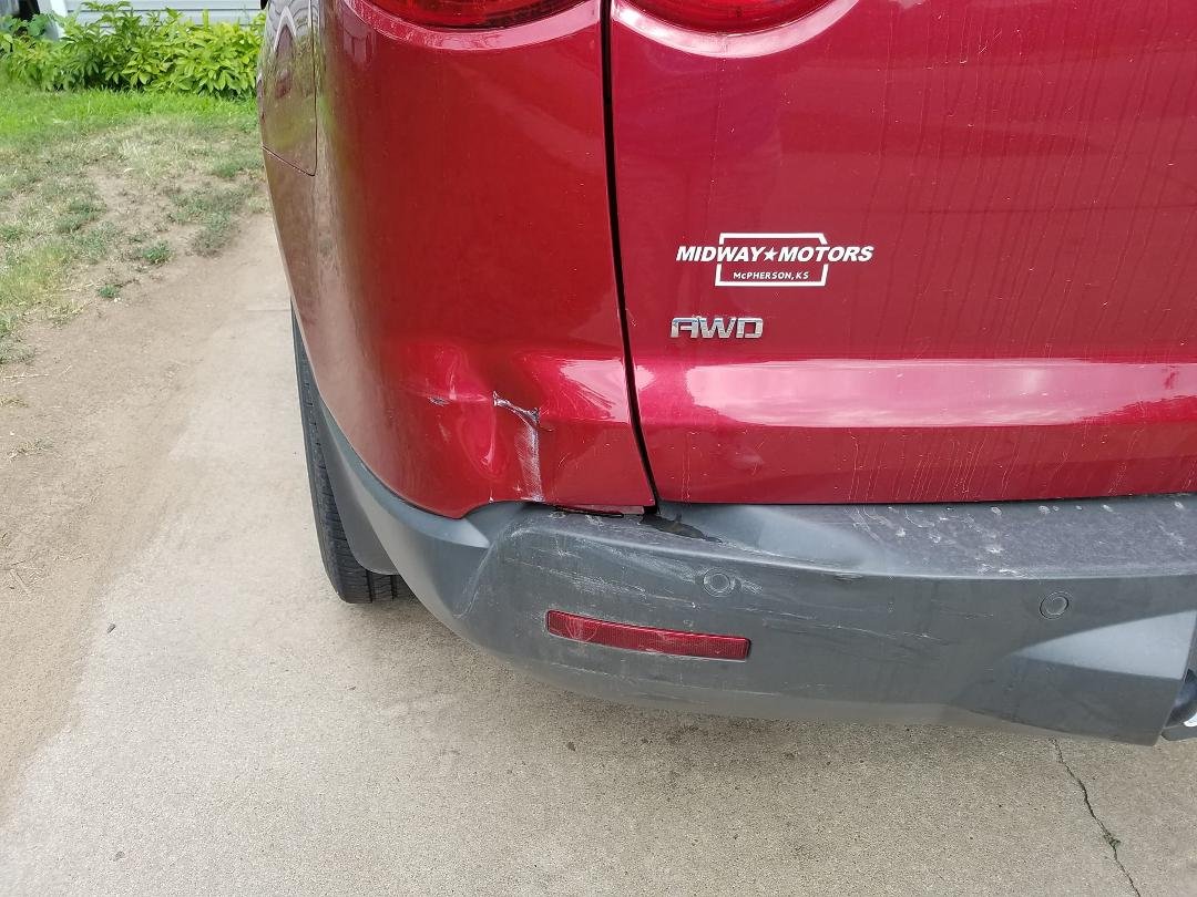 My car got a boo boo today at the grocery store.