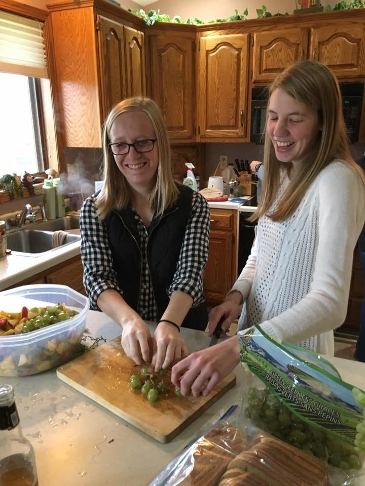 Our college granddaughters helping with Thanksgiving dinner.