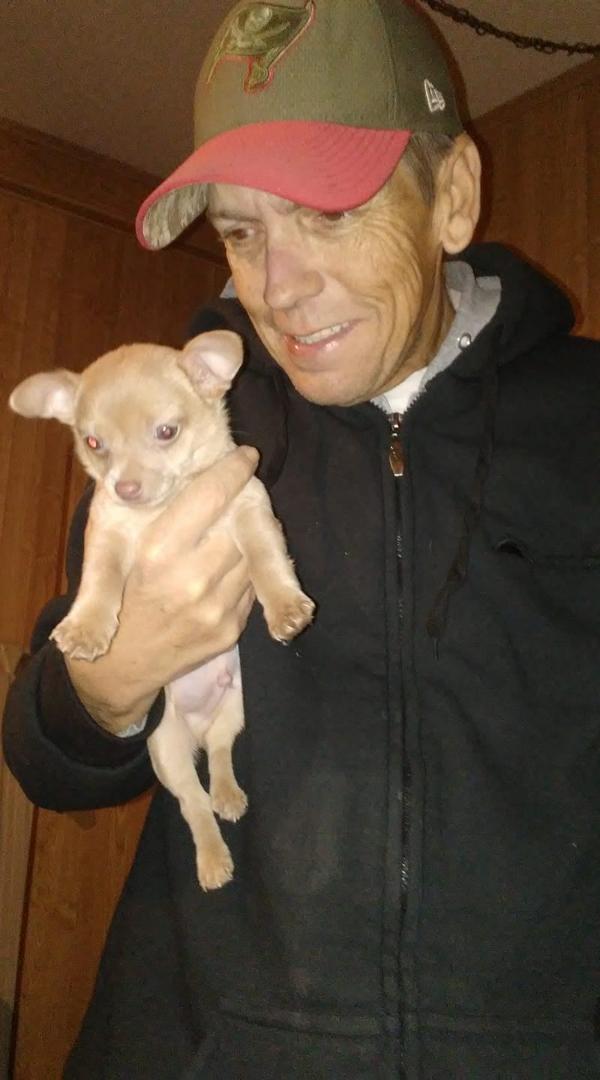 James and his new puppy. Needs to come up with a name.