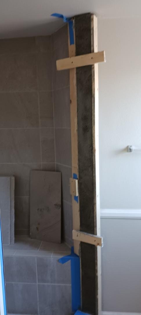Repairs that Christi Galla had to do. The repairs to the Master Bathroom that needed to be done to install a glass door in the shower