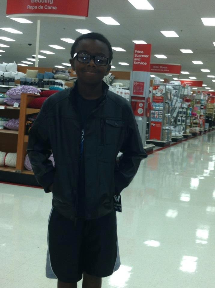 My son trying to look do grown up.