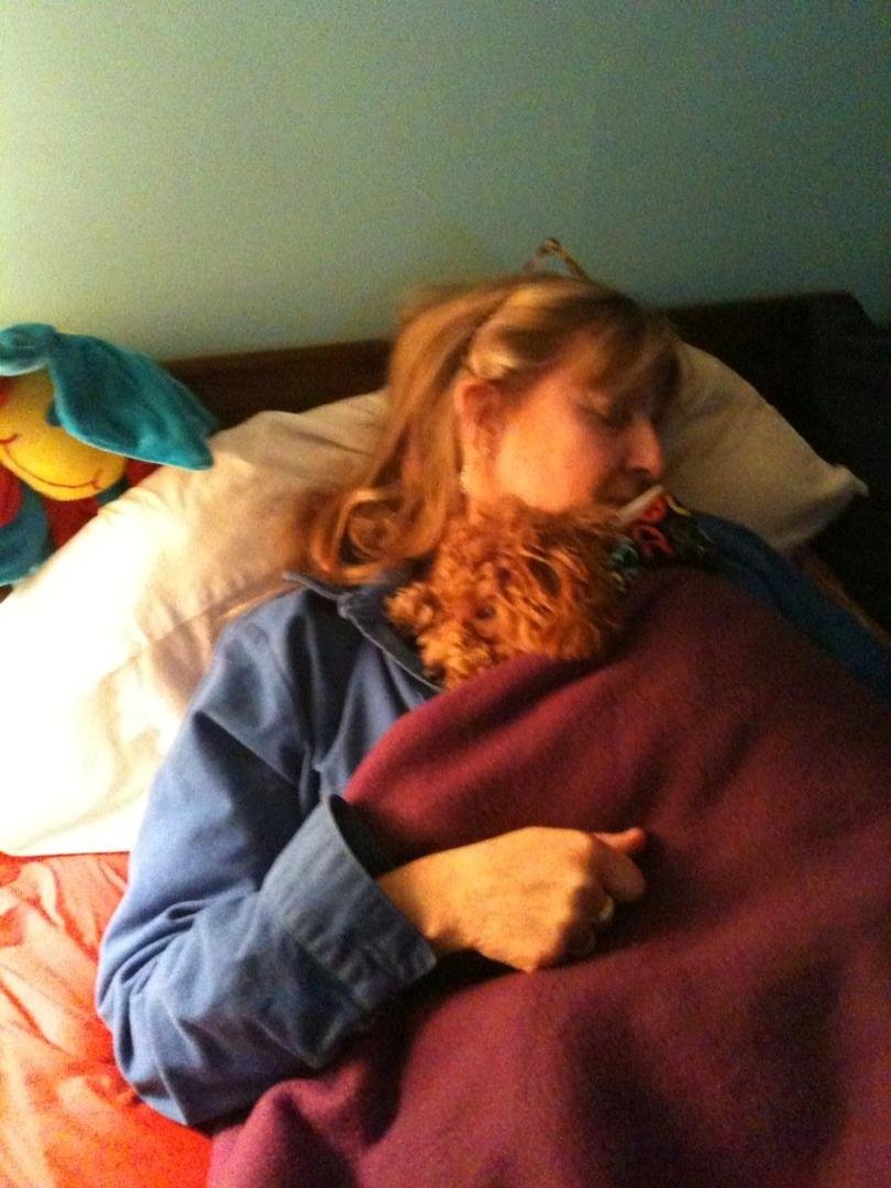 My mom and my baby sister Gracie cuddling. Lol