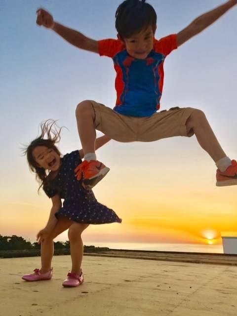 Grandson Ryan, 7, airborne on the roof. On the left, Nina, who had her fifth birthday on Saturday. Many from her nursery school attended and a good time was had by all.