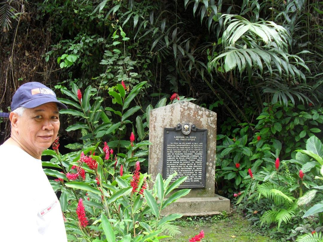 At the entrance of Makahambus Cave, a cave that exited on the other side to reveal an excellent view of the Cagayan de Oro River